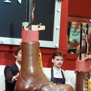 Sothebys auction of Elton John items. Eltons famous Doc Martin boots which he