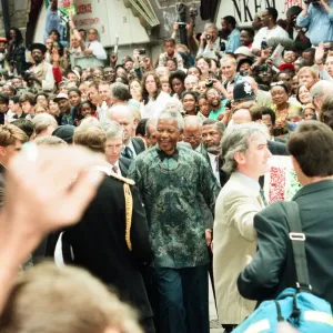 South African President Nelson Mandela seen here visiting Brixton Market with Prince South African President Nelson Mandela seen here visiting Brixton Market with Prince
