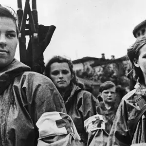 Soviet housewives give up their household brass and copper to the Red Army for munitions Soviet housewives give up their household brass and copper to the Red Army for munitions