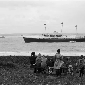 Spectators await the Royal Yacht during the Queens visit to Teesside Silver Jubilee tour