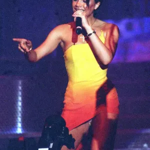 Spice Girls concert Glasgow 5th April 1998 Vicky Adams on stage at concert showing