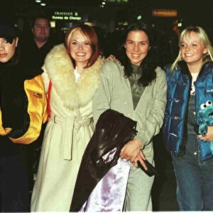 The Spice Girls at Heathrow Airport January 1998 Victoria Adams Geri Halliwell Mel