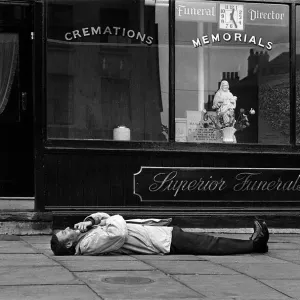 Spike Milligan comedian March 1963 prostate outside an Islington undertakers Spike Milligan comedian March 1963 prostate outside an Islington undertakers