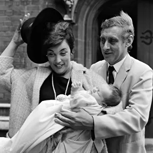 Spike Milligan with wife Paddy holding their new arrival, Jane Fionulla Marion