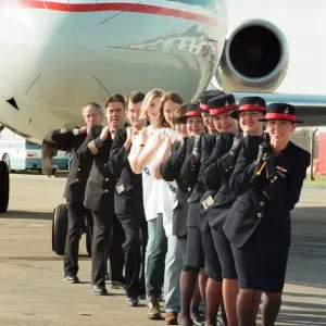 Sponsored aircraft pull at Teesside Airport. British Midland staff are joined by Marie Sponsored aircraft pull at Teesside Airport. British Midland staff are joined by Marie