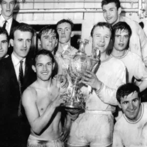 Sport - Football - Swansea Town players hold aloft the Welsh Cup in their dressing room Sport - Football - Swansea Town players hold aloft the Welsh Cup in their dressing room