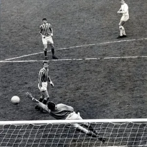 Sport - Football - Swansea Town - Swansea centre forward John Roberts watches his shot Sport - Football - Swansea Town - Swansea centre forward John Roberts watches his shot