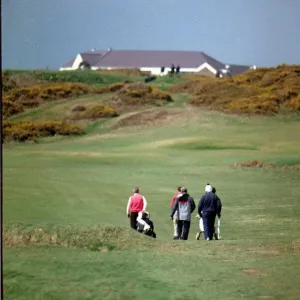 Sport - Golf - Royal Porthcawl - A general shot of golfers playing the course at Royal Sport - Golf - Royal Porthcawl - A general shot of golfers playing the course at Royal