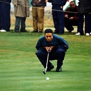 Sport - Golf - Walker Cup - Royal Porthcawl - Tiger Woods of America lines up a putt in
