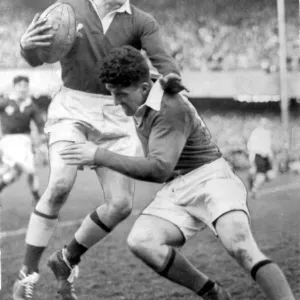 Sport - Rugby - Wales v Ireland - Lewis Jones, the young Welsh full back is seen avoiding