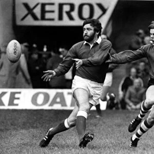 Sport - Rugby - Wales v Presidents XI - Ray Gravell gets the ball away for Wales as