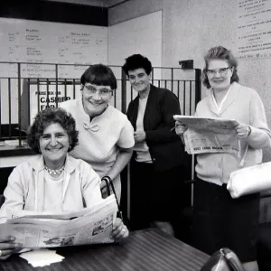 Four sporting ladies smiling after placing winning bets at a Ladies only betting shop in
