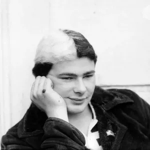 Spurs fan Dale Mitchell, with hair dyed blue and white queues for tickets to the Cup Spurs fan Dale Mitchell, with hair dyed blue and white queues for tickets to the Cup