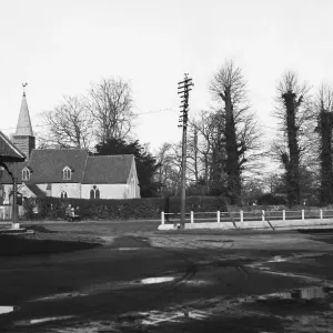 St Giles church at Ickenham, London, in the fore ground is the village pump Circa 1930 St Giles church at Ickenham, London, in the fore ground is the village pump Circa 1930