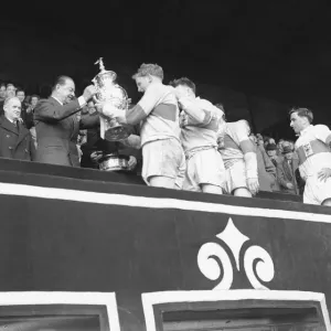 St Helens are presented with the trophy after their 13 - 2 victory over Halifax in St Helens are presented with the trophy after their 13 - 2 victory over Halifax in