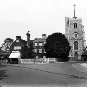 St John the Baptist Church and High Street Pinner, London. Circa 1930 St John the Baptist Church and High Street Pinner, London. Circa 1930