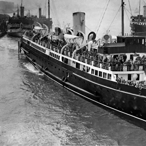 The St. Seiriol leaving Liverpool crowded with happy trippers on the first stage of their