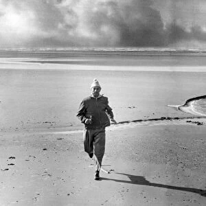 Stanley Matthews seen here training on an expanse of Blackpool Beach, October 1961