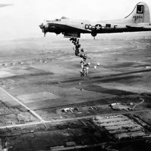 Starving Dutch population bombed with food -- streaming from the bomb bay of a Starving Dutch population bombed with food -- streaming from the bomb bay of a