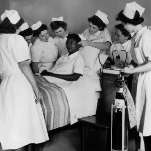 State hospital nurses learning how to administer oxygen by spectable frames