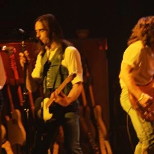 Status Quo, English rock band, onstage in 1981. Picture shows (left