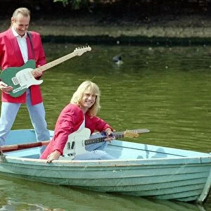 Status Quo wearing red coats at Butlins holiday camp. September 1990 1990s