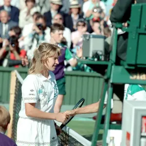Steffi Graf pictured at the net shaking the hand of Martina Navratilova who she has just Steffi Graf pictured at the net shaking the hand of Martina Navratilova who she has just