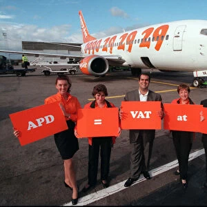 Stelios Haji-loannou of easyJet October 1997 With staff beside aircraft Holding orange