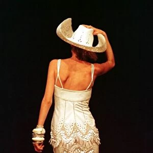 Stella Tennant sports a cream cowboy dress October 1997