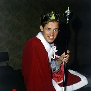 Stephen Hendry sitting on table dressed as a king 1987