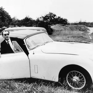 Stephen Ward gets out of MGA car July 1963 Stephen Ward gets out of MGA car July 1963