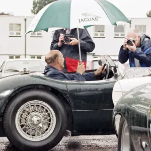 Sterling Moss in a C-Type Jaguar Print from Memory Lane Sterling Moss in a C-Type Jaguar Print from Memory Lane