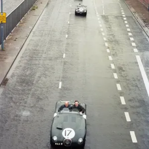 Sterling Moss drives reporter in C-Type Jaguar Print, 16th June 1993 Sterling Moss drives reporter in C-Type Jaguar Print, 16th June 1993