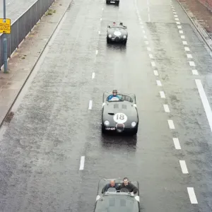 Sterling Moss takes takes Evening Telegraph reporter Alan Poole for a spin in the same Sterling Moss takes takes Evening Telegraph reporter Alan Poole for a spin in the same