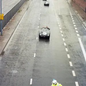 Sterling Moss takes takes Evening Telegraph reporter Alan Poole for a spin in the same Sterling Moss takes takes Evening Telegraph reporter Alan Poole for a spin in the same