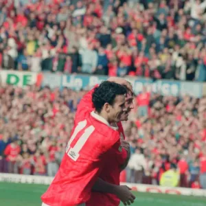 Steve Bruce, congratulated by Ryan Giggs (number 11) pictured at the end of the match Steve Bruce, congratulated by Ryan Giggs (number 11) pictured at the end of the match