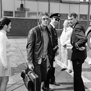 Steve McQueen, pictured at London Heathrow Airport, heading to Paris, France