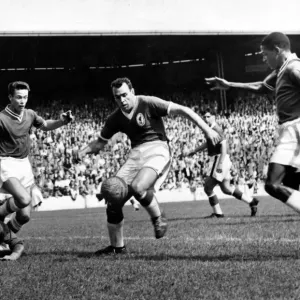 and Steve Mokone battle for the ball in the Liverpool goalmouth during their teams 3-2 and Steve Mokone battle for the ball in the Liverpool goalmouth during their teams 3-2