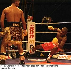 Steve Robinson hits the canvas floored by Prince Naseem Hamed during WBO featherweight