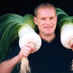 Steve White with his giant prize winning leeks in September 1994