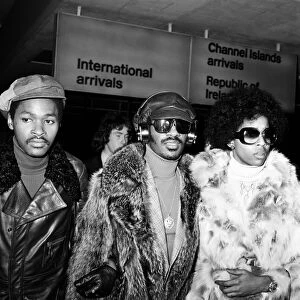 Stevie Wonder arriving at London Airport with Yvonne Wright. 24th January 1974