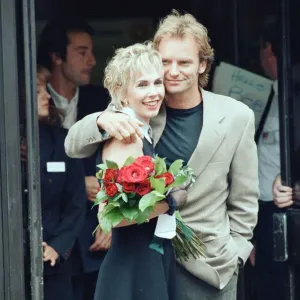 Sting holds and his bride Trudie Styler outside Camden register office, London Sting holds and his bride Trudie Styler outside Camden register office, London