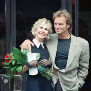 Sting holds and his bride Trudie Styler outside Camden register office, London Sting holds and his bride Trudie Styler outside Camden register office, London