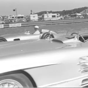STIRLING MOSS (FOREGROUND) WITH JUAN FANGIO (BACKGROUND) - SEPT 86 STIRLING MOSS (FOREGROUND) WITH JUAN FANGIO (BACKGROUND) - SEPT 86