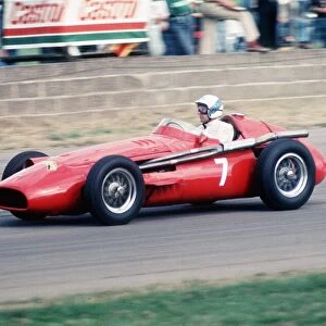 Stirling Moss racing in a Maseratti at Brands hatch