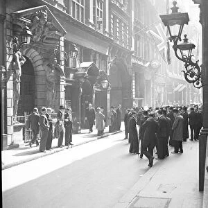 Stockbrokers and stock jobbers seen here outside the London Stock Exchange before