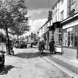 Street scene in Beaconsfield, Buckinghamshire. Women and young girls walking down