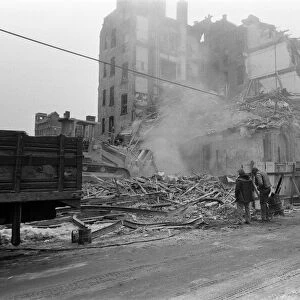 Street scene in New York, a building being demolished. 13th February 1981