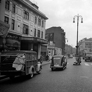 Street Scene in and around Notting Hill Gate London. March 1953 D1599