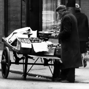 A street trader with his barrow on the streets of Newcastle on 5th April 1966
